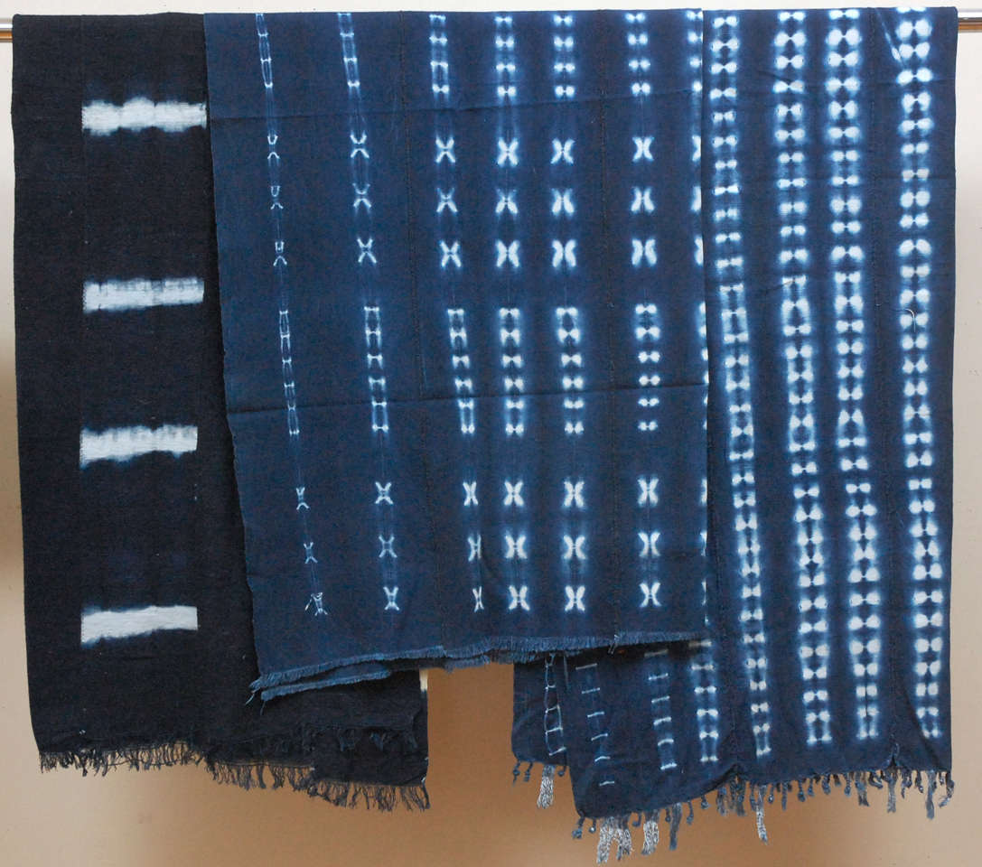 Natural indigo resist dyed panels, backstrap loomed by hand.  Long strips sewn together.  Made by Dogon tribal peoples in W. Africa.   Right and Middle pieces SOLD.