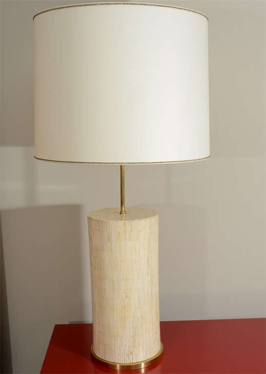 Large scaled table lamp with brass base and drum shaped body crafted from bone, 1950s. Stem has an element to adjustable the height.