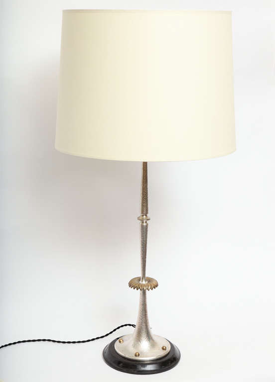 A 1920s Austrian silver and brass Art Deco table lamp.
Shade not included