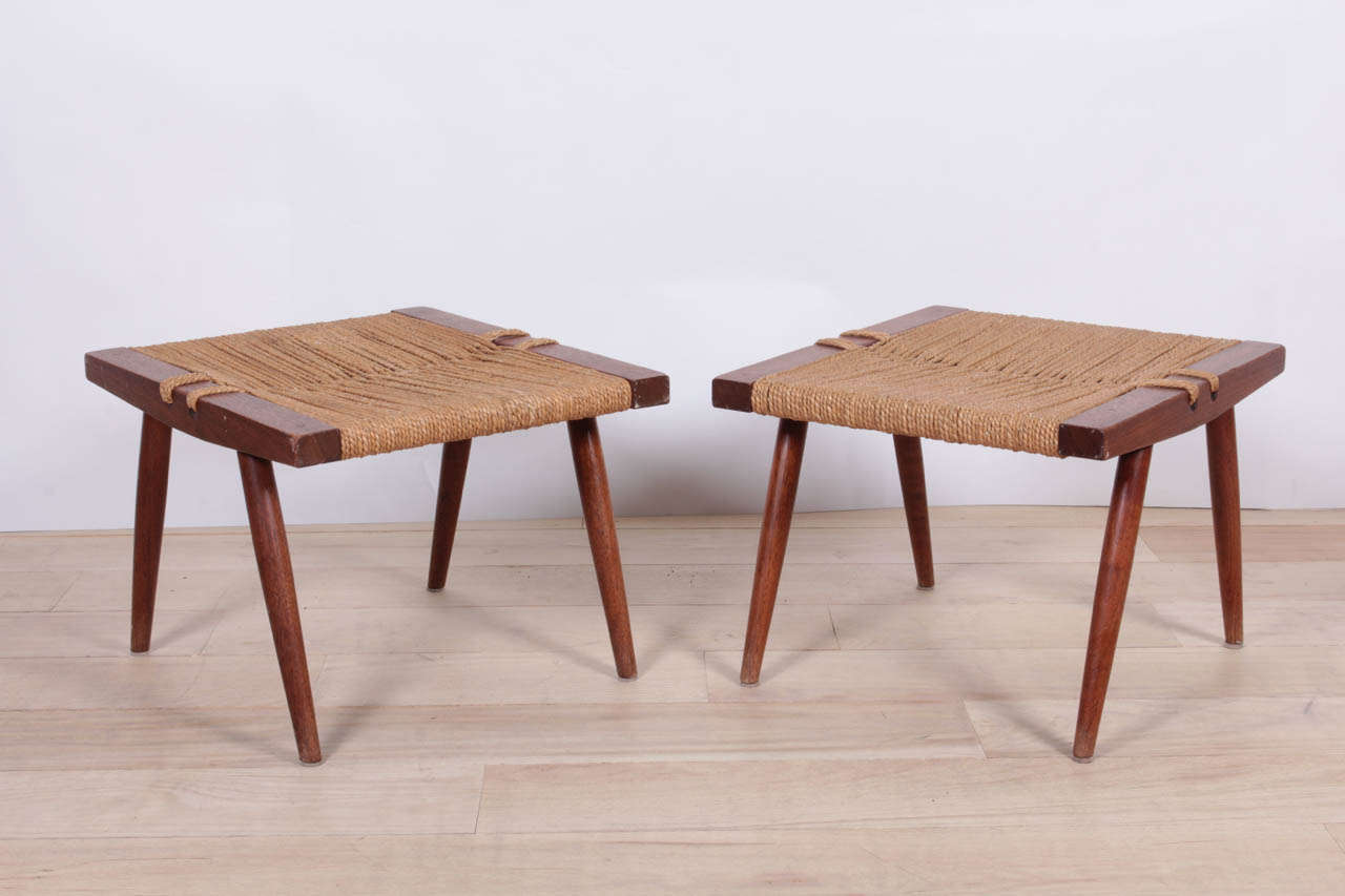 Pair of Grass seated ottomans in walnut and rush.

Signed and dated.