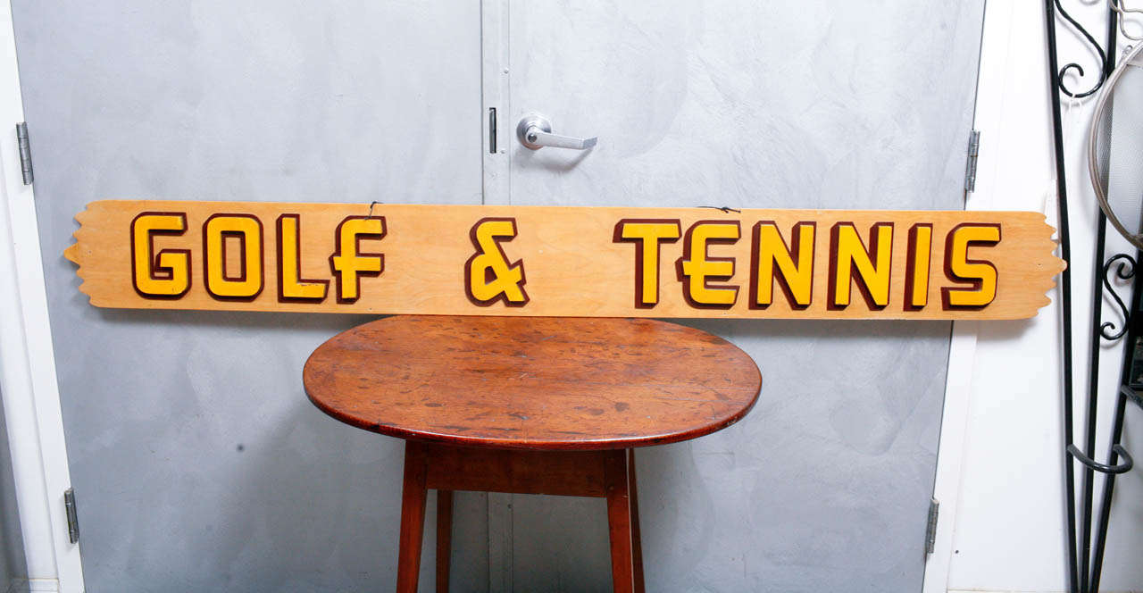 This is a delightful piece of mid-century signage that we were thrilled to find. This piece is one of those hard to find gems that you cannot pass up. It seems to be a relic from a 1950's country club or sporting goods store. The articulated raised