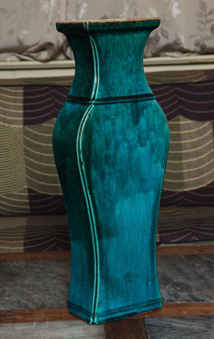 Antique deep turquoise slab built vase .