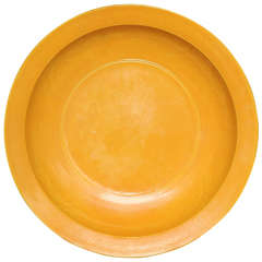 A striking Chinese incised platter in imperial yellow color