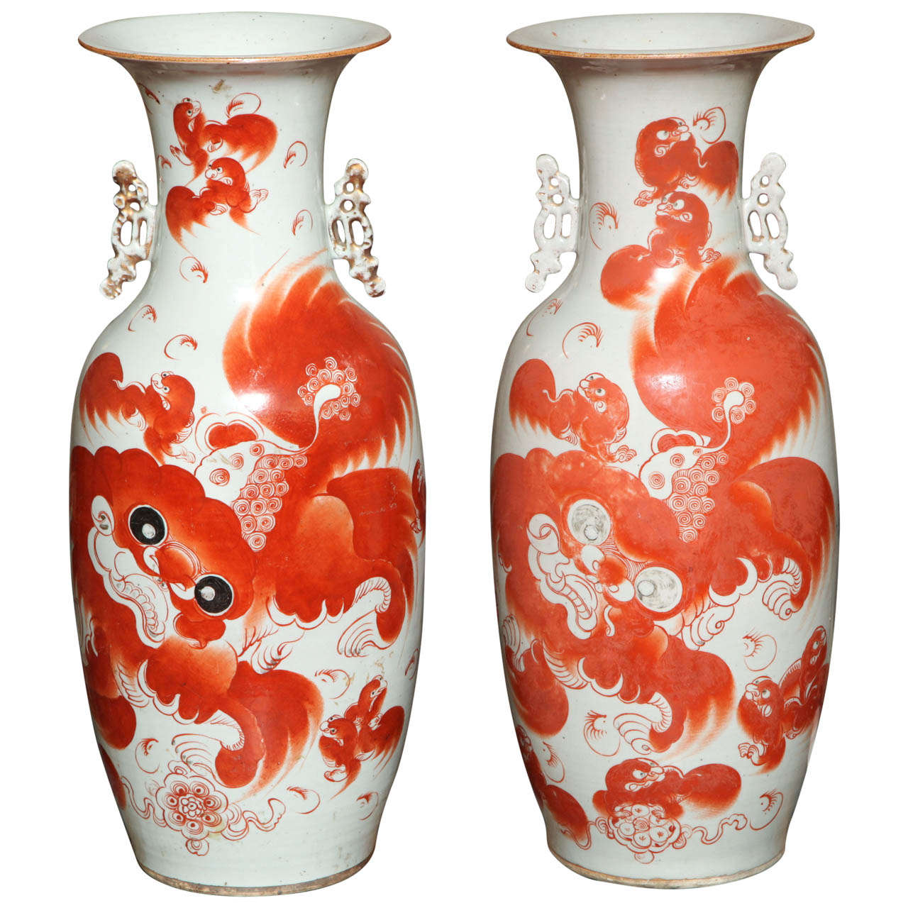 a pair of antique Chinese "dancing fu dog" vases For Sale