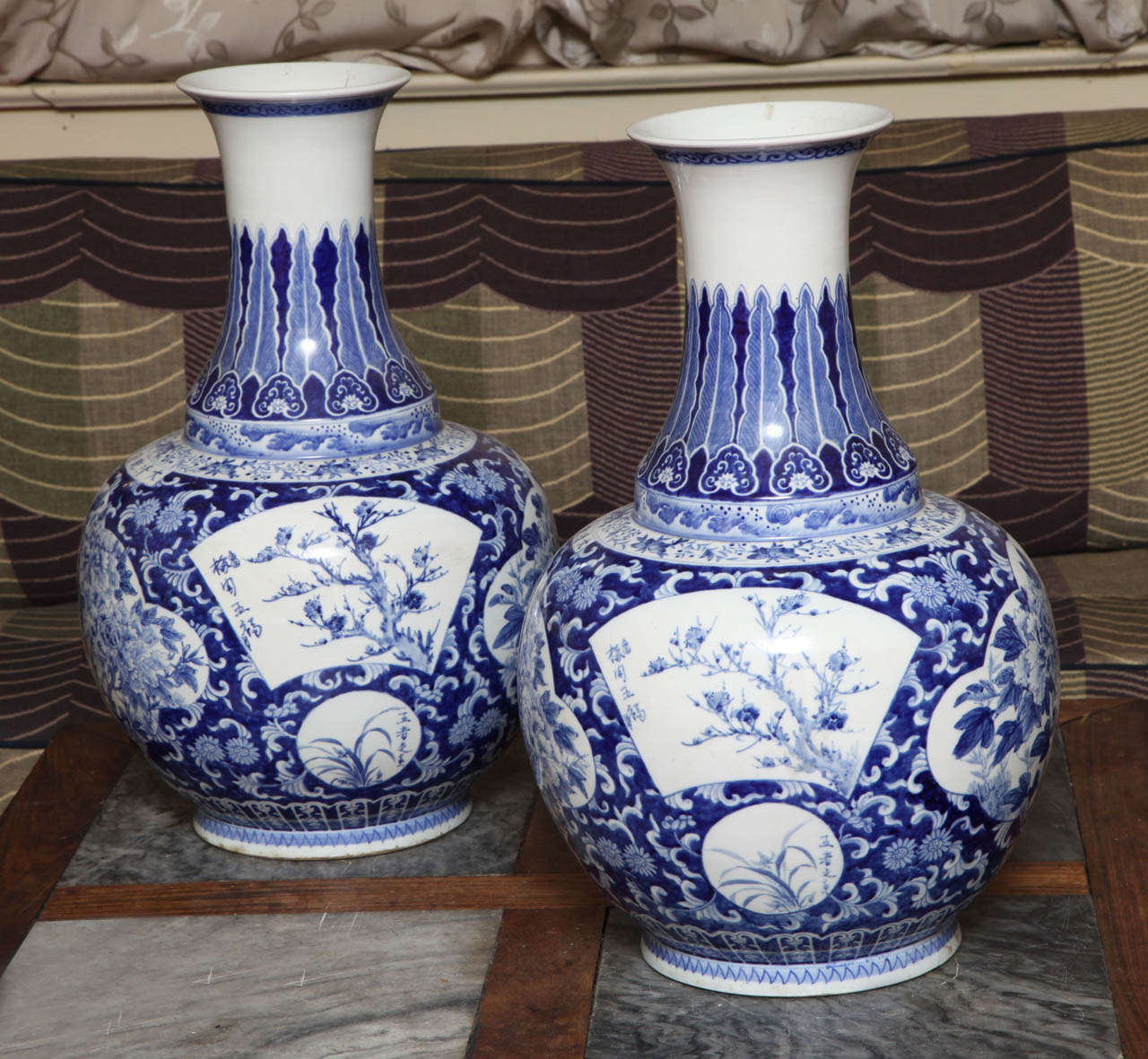 A magnificent pair of blue and white Chinese vases