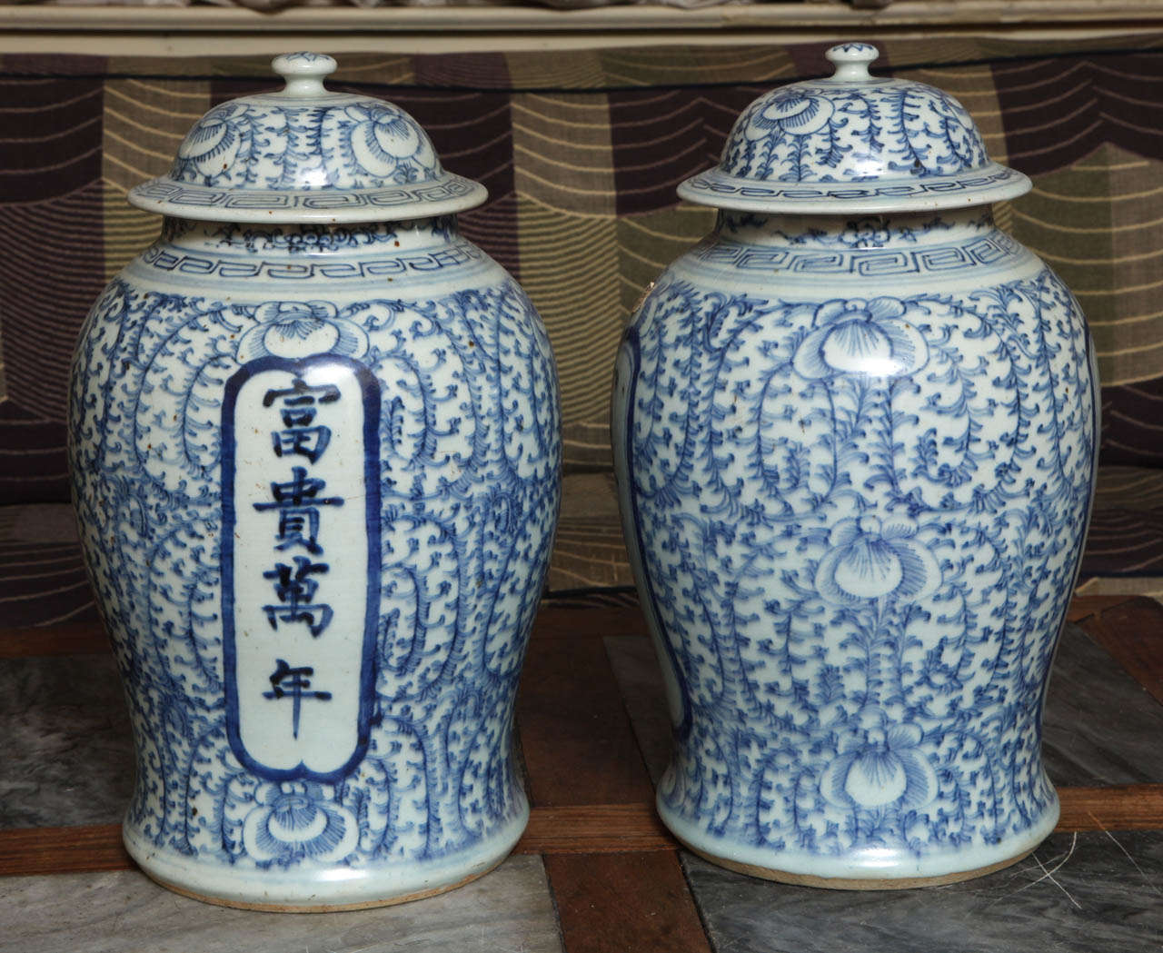 A rare pair of Chinese temple jars with Chinese characters, and original lids.
in excellent original condition. One of the rarest patterns in Chinese export porcelain. PRICED AND SOLD ONLY AS A PAIR