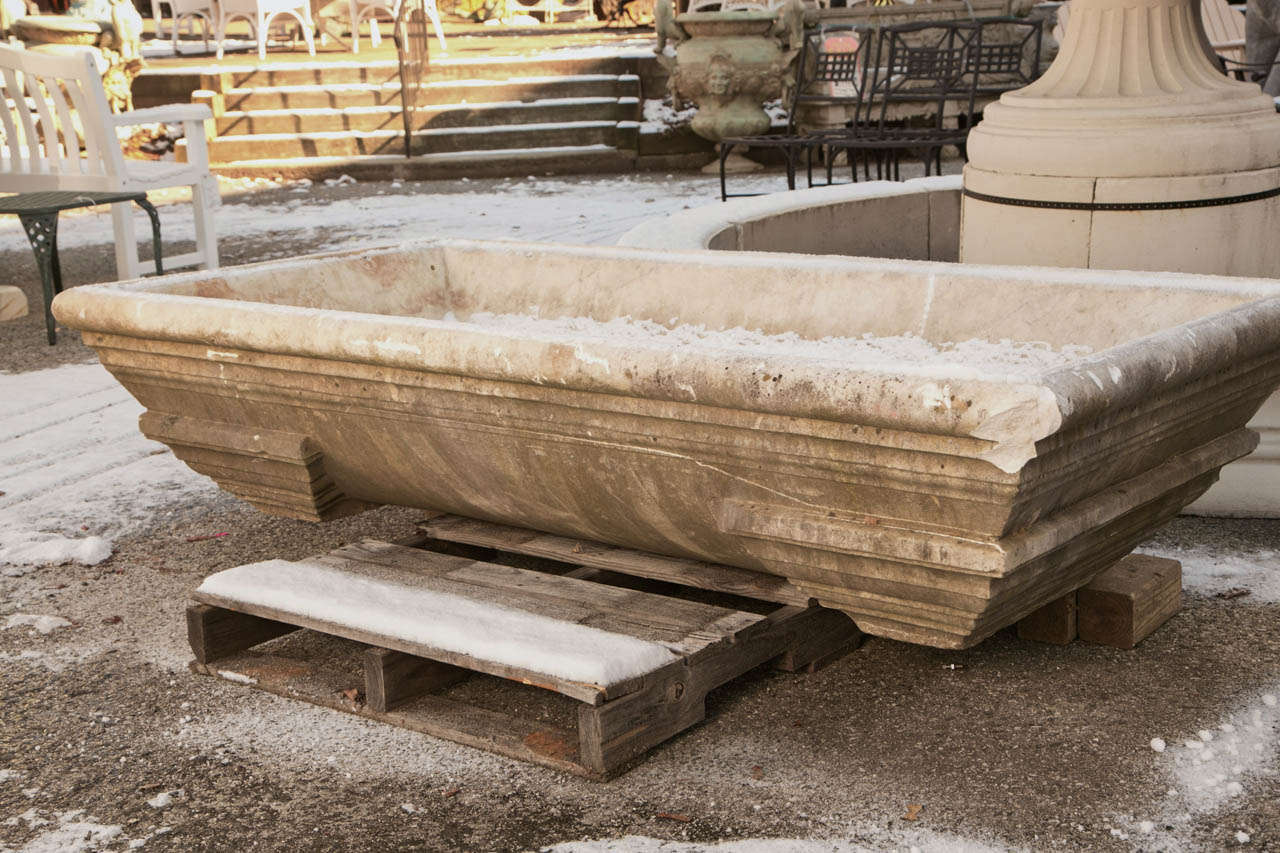 This antique marble fountain base was once part of a large fountain.  We have only this base.  It was used as a basin off a fountain.  Acquired from a large Greenwich, CT estate.  It can be used for a statue/fountain or even large flower planter. It