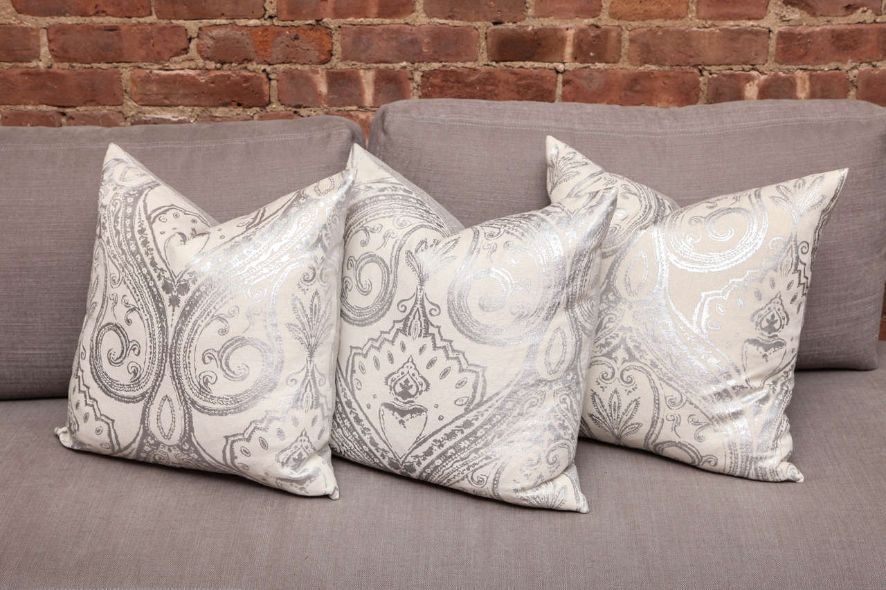 These Custom Made pillows are fresh and whimsical with their hand painted metallic pattern. The reflective hints of silver and movement through out the pillow is a perfect accent for a light and airy environment. Handmade in United States.