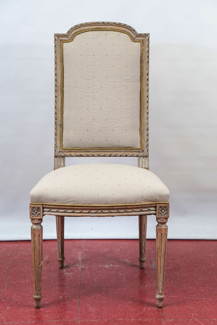 Vintage Louis XVI Style side chair with beautiful detail carving and newly upholstered in beige quilted fabric on seat and back and complementary gold silk fabric on the back.  Can work well in Swedish Gustavian style decore.