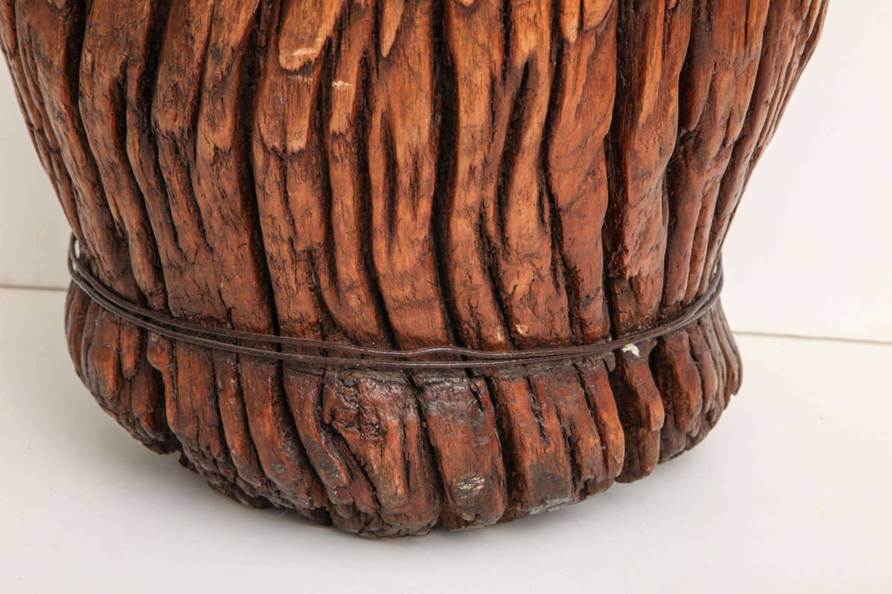 A 19th century Japanese hollowed rootwood vessel
suitable as a log basket, umbrella stand or sculpture