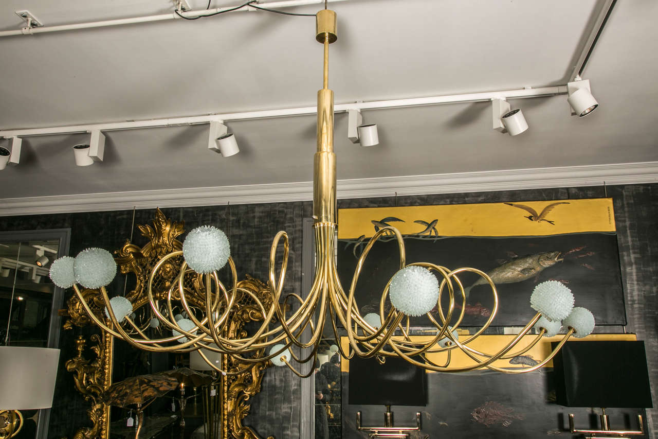 Pair of brass and glass chandeliers, 12 arms ending by glass fragments bowls, creation for Glustin Gallery, limited to 12 pieces, artist Laurent Beyne.

ONE AVAILABLE