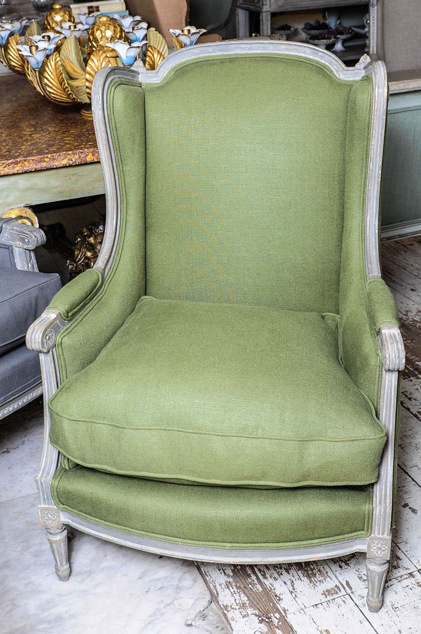 French grey/green patinated fauteuil, with a green linen fabrique.
