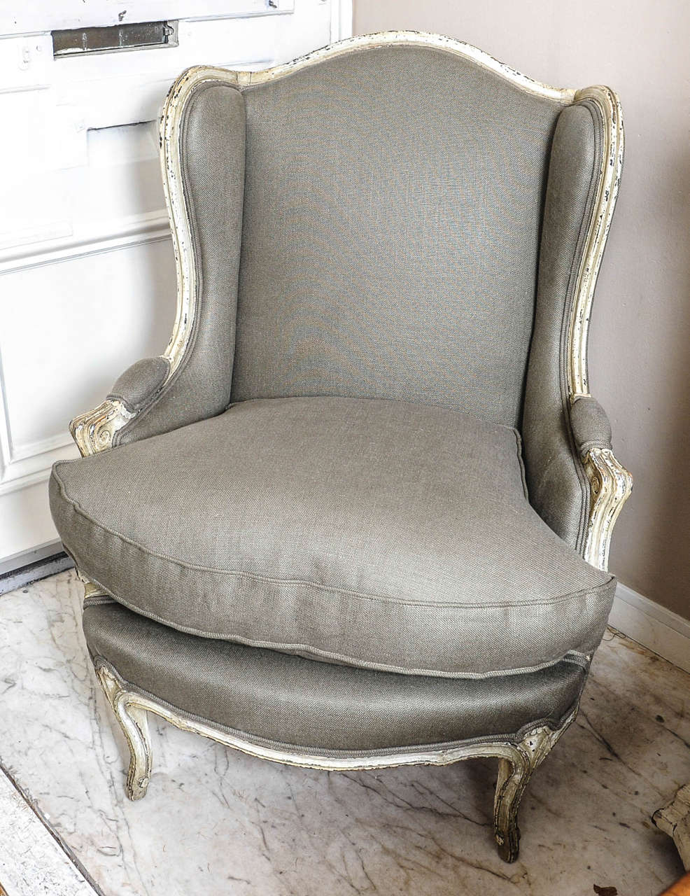 19th.Cent.Fauteuil dirty Ivory/brown coloured with grey/green linen fabrique