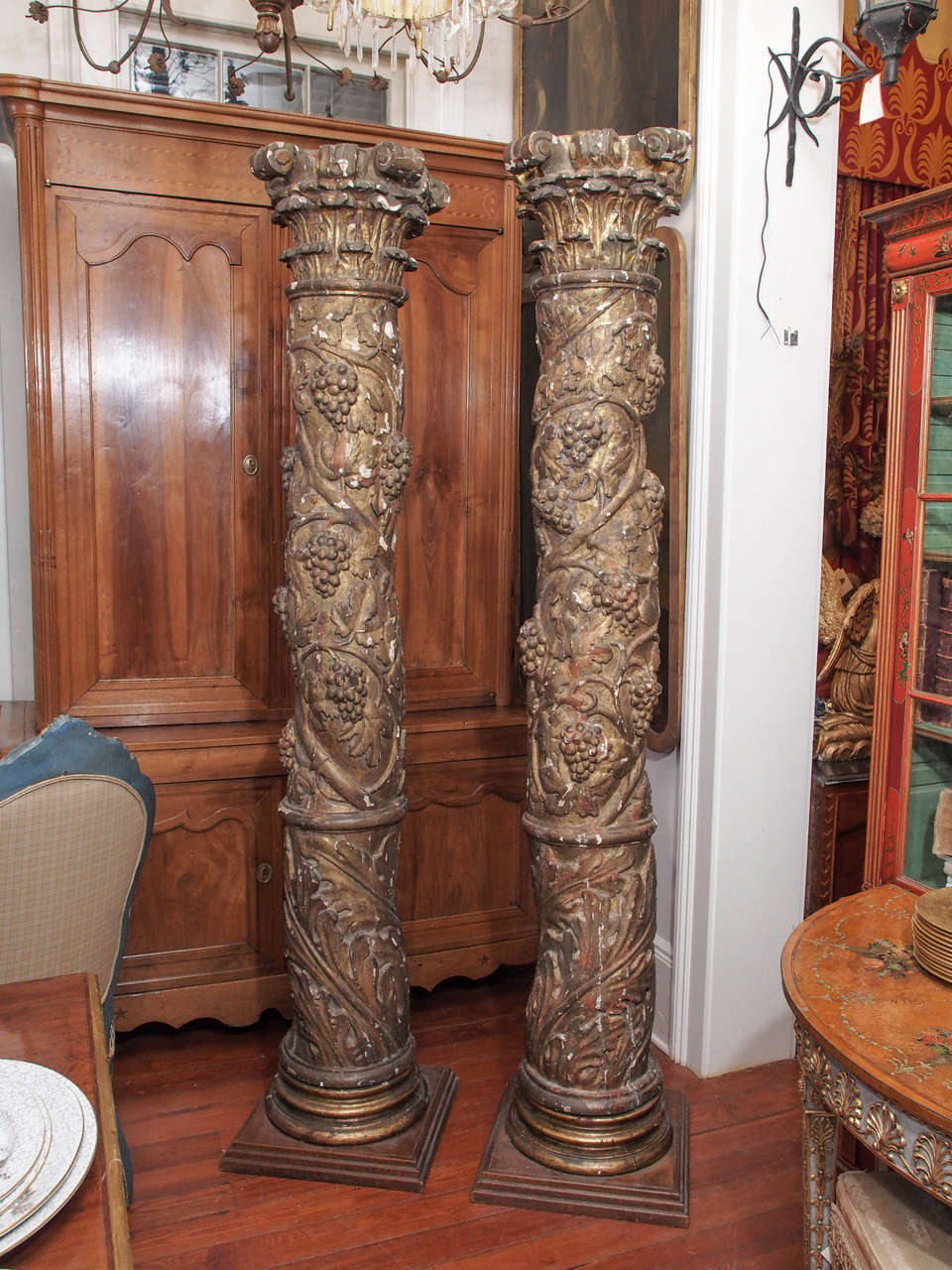 Pair of 17th century solomonic columns carved from an entire tree. 
The reverse is not finished and said tree can be seen.