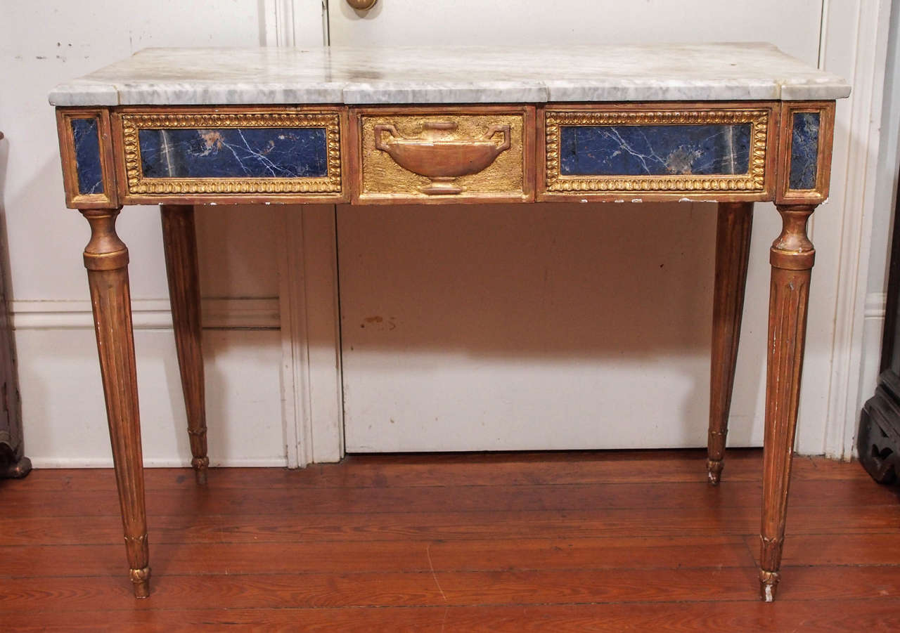 Giltwood console table Italian Louis XVI with inset panels of Lapis Lazuli. 
Statuary marble top.