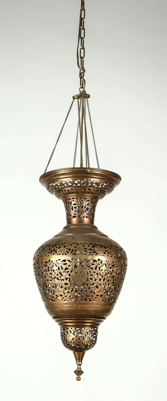 Vintage Moroccan brass hanging light fixture, delicately handcrafted and hand chiselled with floral and geometrical Moorish designs.
Rewired ready to use.
Collector brass decorative Islamic art pendant great to use in your next Moroccan