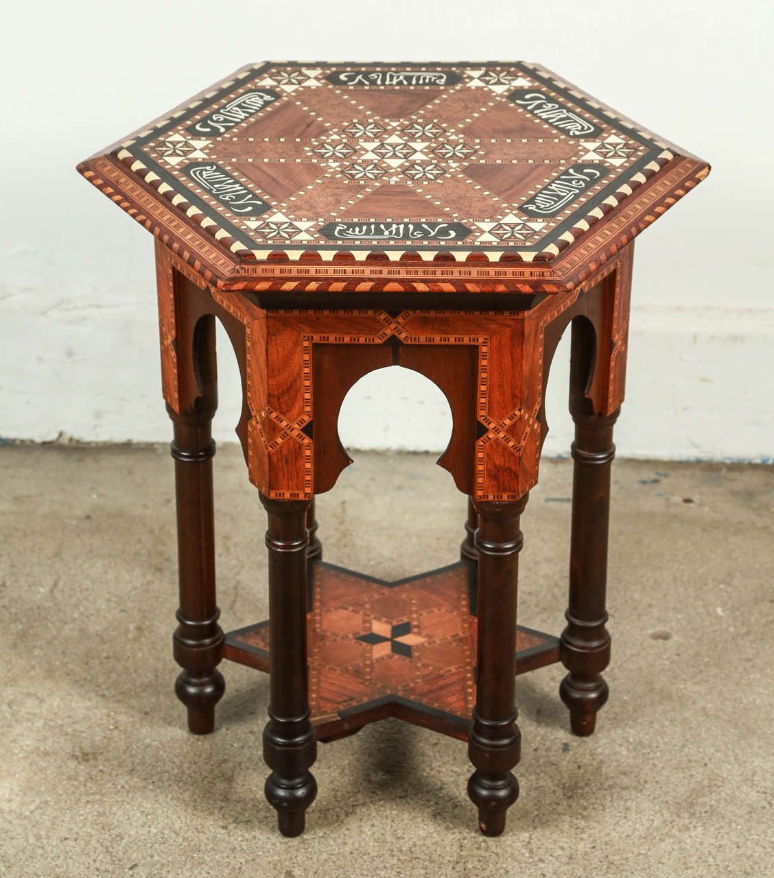Hispano Moresque marquetry wood occasional side table. Custom order. Limited edition.
Hexagonal form with six turned legs and six pointed star shape at the bottom.
Bone inlaid, ebony, bone and mother-of-pearl and marquetry with geometric and floral