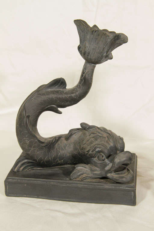 Josiah Wedgwood named the black earthenware body that he created Black Basalt, as it resembled Egyptian basalt. He made his first known reference to ceramic dolphins in 1770 and refers to dolphins of black basalt in 1783.  Associated with Poseidon,