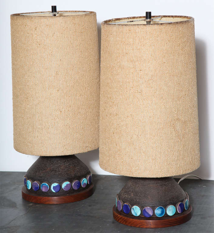 Pair of low, Italian Modern, Aldo Londi for Bitossi Dark Stoneware Table Lamps.  Featuring a low triangular textured Deep Earthen Brown surface, applied glazed discs in Purple, Lavender, Aqua, Pale Blue and Deep Blue on a round Dark Walnut base.