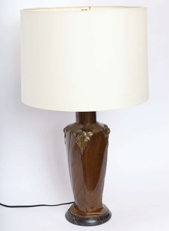 A French Art Deco patinated bronze table lamp signed Marionnet, France 1920's
New sockets and rewired
Shade not included