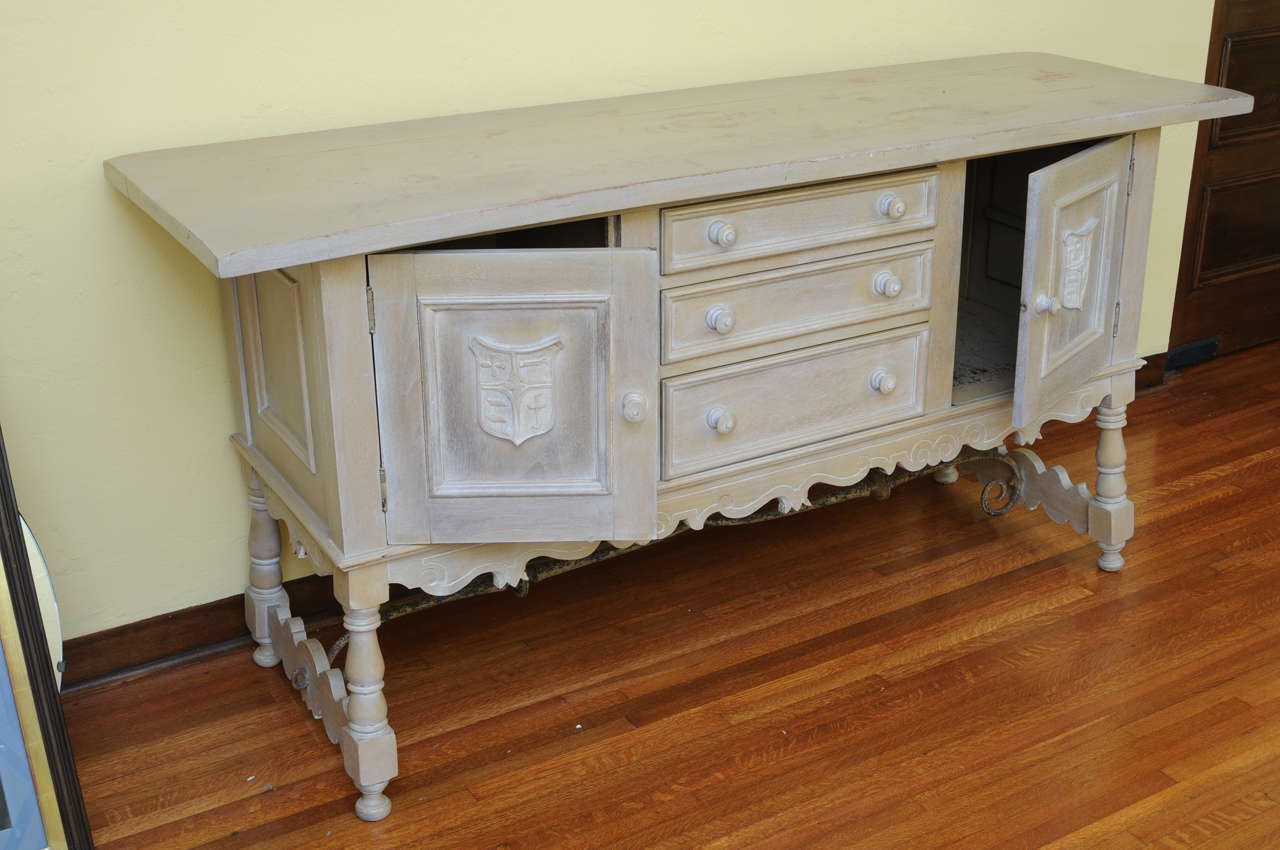 Hand carved 1920's Spanish Revival sideboard attributed to Addison Mizner.  Reduced from $2,500.00.

Please feel free to contact us directly for a shipping quote or any additional information by clicking 