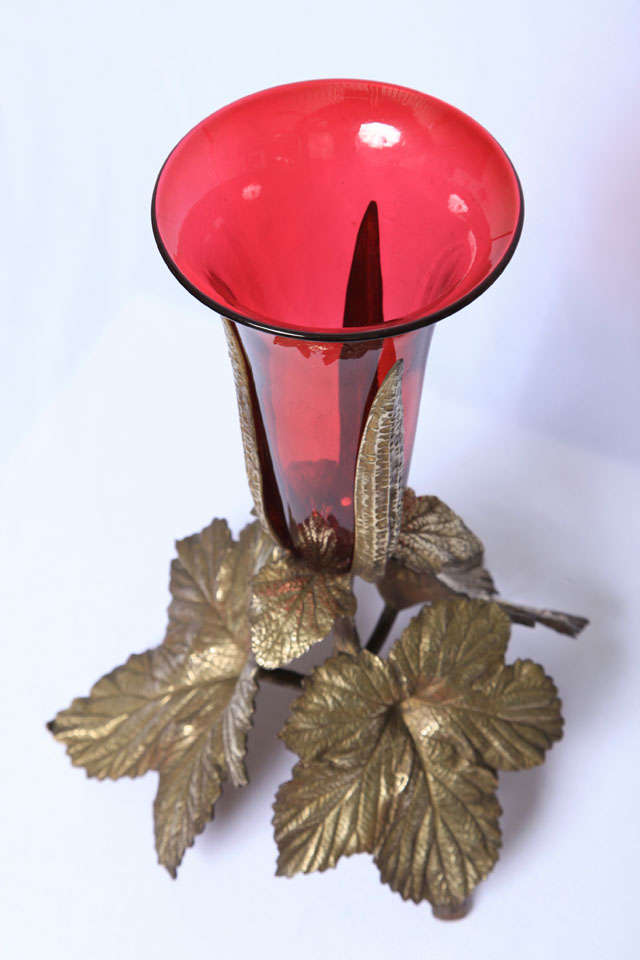 Vase with bronze vine leaf base