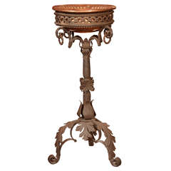 Wrought iron Jardiniere with copper bowl.
