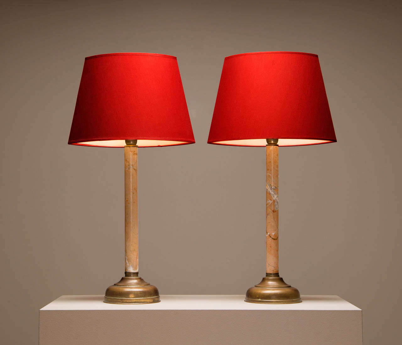 Unique pair of Italian table lamps with nice marble stem and brass foot with nice patina to the surface.

The bottom of the base is signed, Tomasso Barbi, Roma, Italy.
