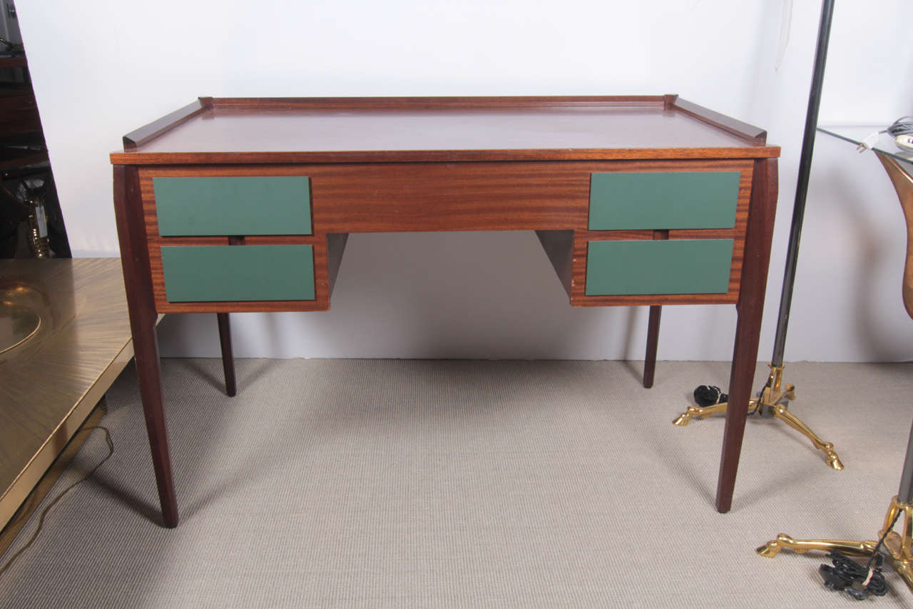 Rare Italian desk in mahogany.
Sometime sold for Gio Ponti in Auction
 (a second available).