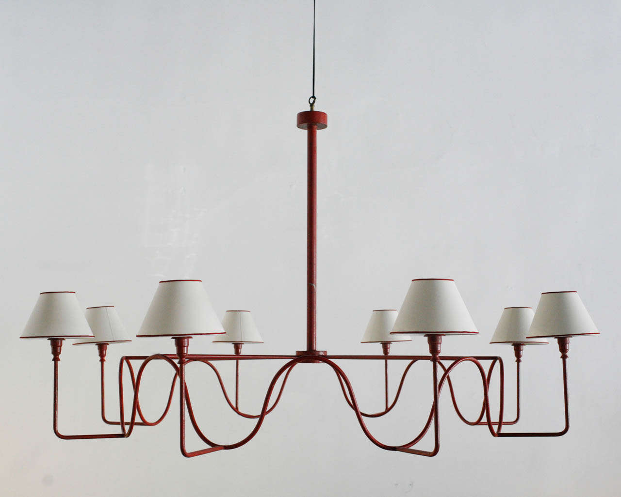 a jean royere chandelier by french designer jean royere.