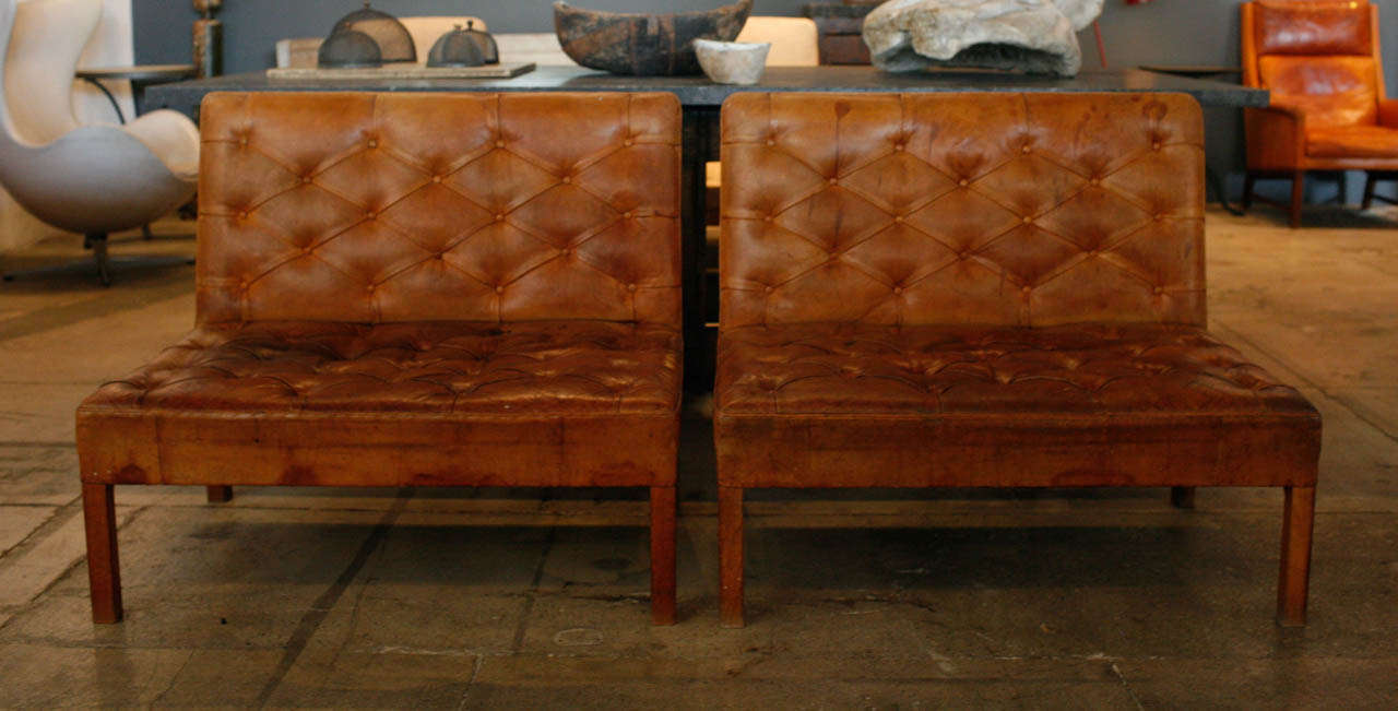 a pair of kaare klint's tufted leather settee's in their original cognac leather . frames is solid cuban mahogany. 
sold only as a pair. no damage or repairs to leather. original condition.