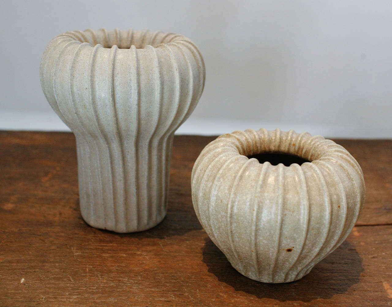 two glazed stoneware vases by scandinavian ceramist , arne bang. artist signature to bottom of both ceramics. sold individually.

dimensions 

left :   ht 6.75 diameter 6
right:  ht 4.25 diameter 5.5