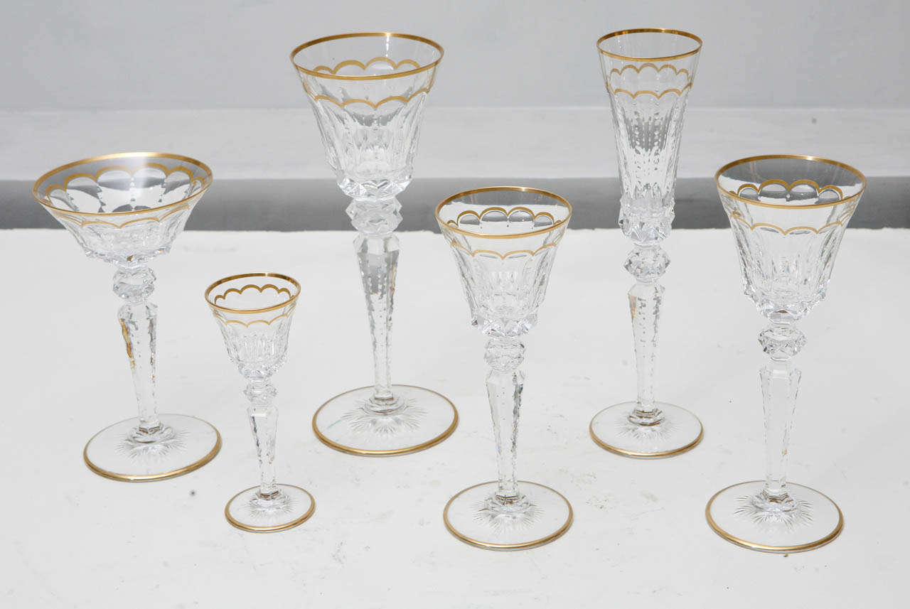 Set of 175 (approx.) Saint-Louis Cut Crystal with Gold.  Excellence Pattern. Various sizes and heights.  Measurement below is for Champagne Glass (11 inches tall)