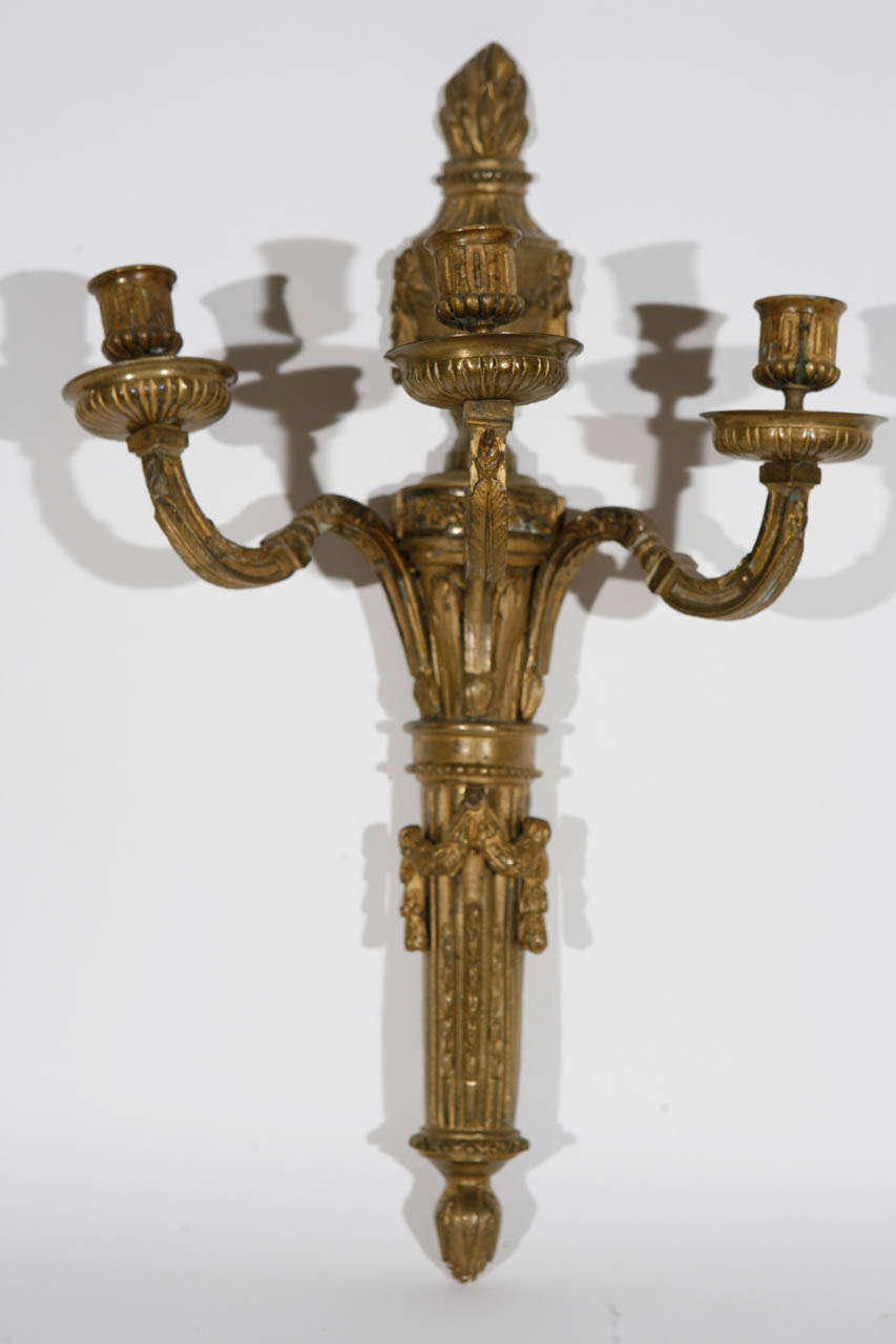 Pair of late 19th c. French Dore Bronze Sconces with Urn and Flame Motif.