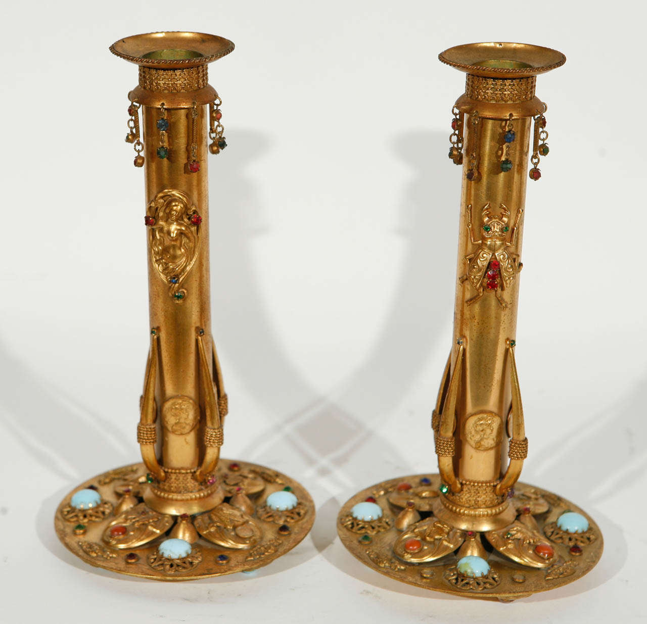 Pair of French Egyptian Revival  Bronze Stone Encrusted Candlesticks. The base diameter measurement is 4.5 inches.
