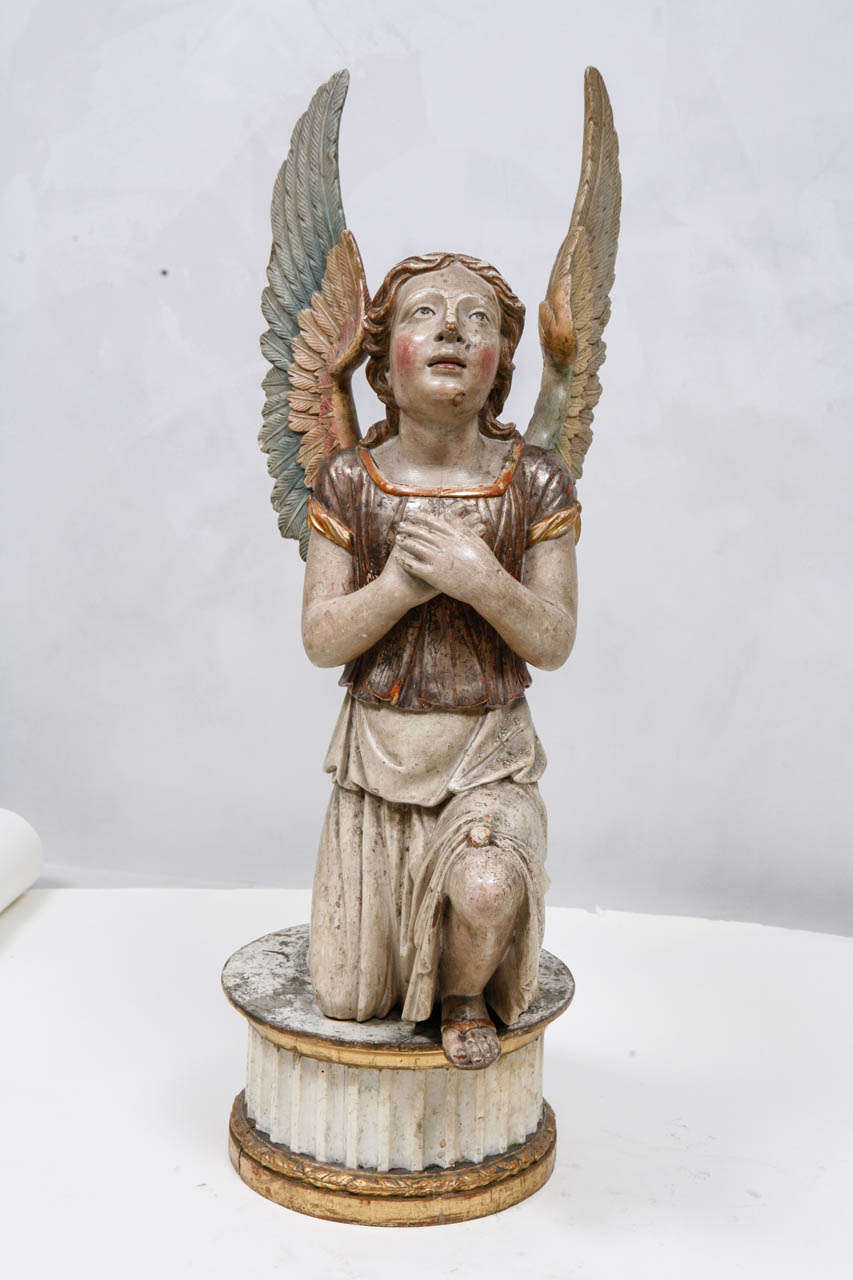 19th c. Italian Carved Giltwood and Polychromed Winged Angel on Base.  The base measurement is 11 inches.