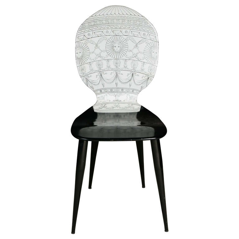 A "Mongolfiera" Chair by Piero Fornasetti.