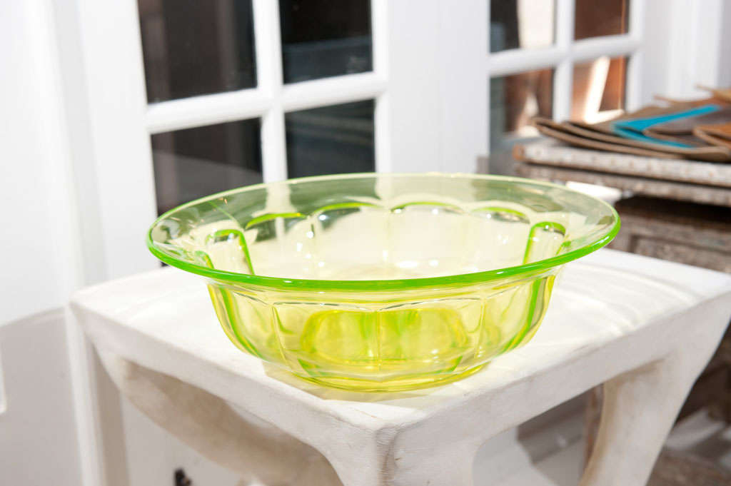 Uranium glass, also called Vaseline glass, bowl in an uncommonly large size. When put under a blacklight these pieces of glass are fluorescent.