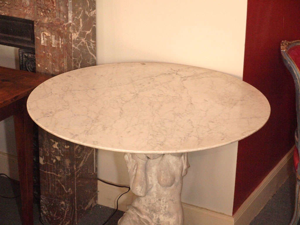 Table Composed of a Romantic 19thC Italian Cast Stone Statue and Marble Top In Good Condition For Sale In New Orleans, LA