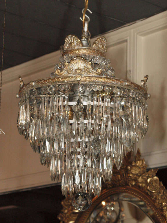 Antique French crystal waterfall chandelier. Double crown top.