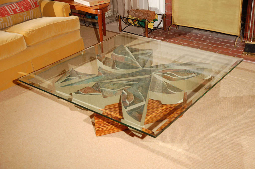 Grand and breathtaking, this coffee table, designed by none other than the imitable Southern California contemporary artist Laddie John Dill, will make any living space soar with fantastic style. The beveled glass (3/4