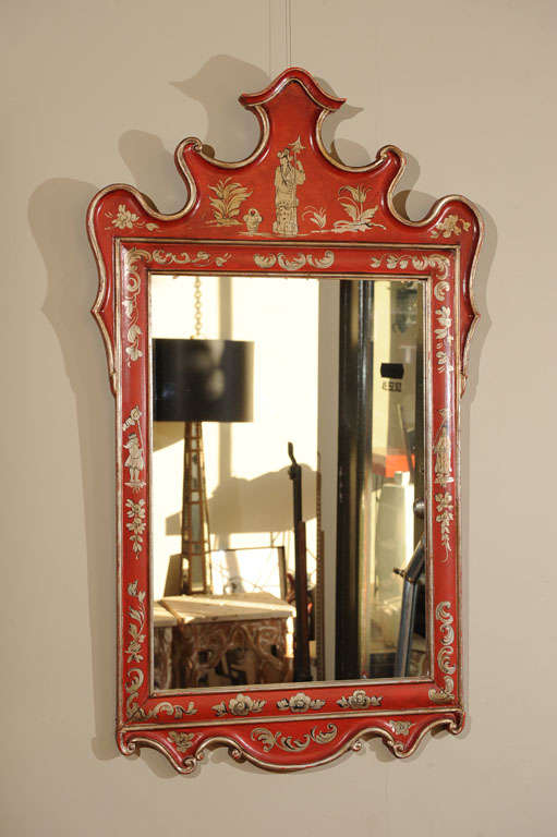 A beautiful carved wood Chinoiserie decorated framed mirror