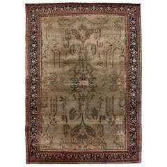Antique Persian Sarouk rug