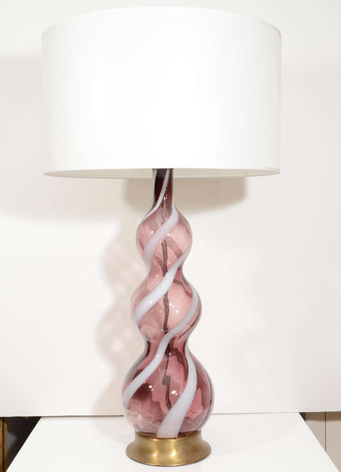 A sculptural Murano glass lamp in violet on brass base, Ca. 1970s.