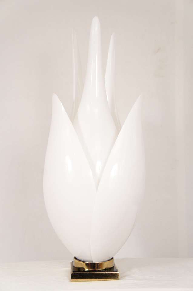 a favorite of mine.
A Rougier flower lamp designed to represent a large white tulip.
the lamp is made of acrylic petals with a bronze plated base.