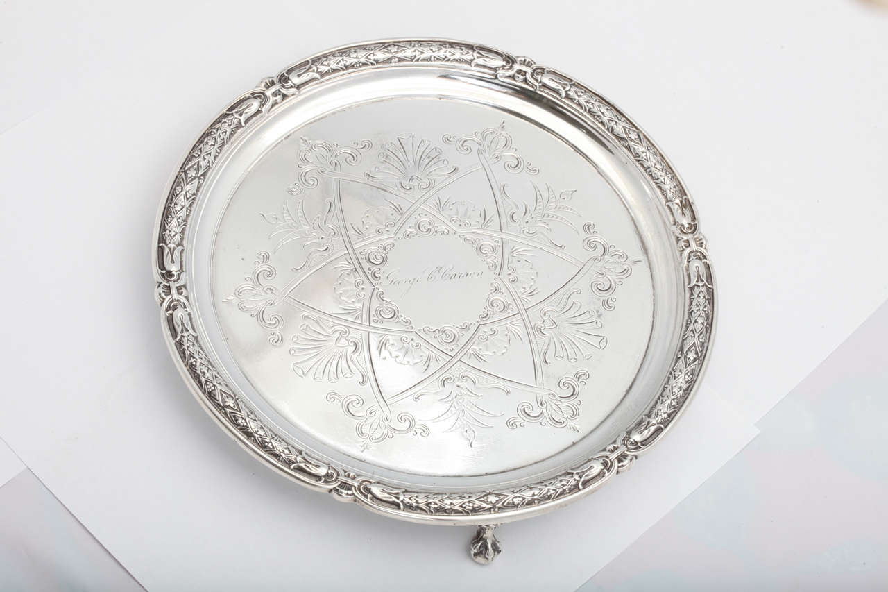 American coin silver, footed salver, The Gorham Corp., Providence, Rhode Island, circa 1850s. Ball and claw feet; lovely engraved design; cartouche engraved 
