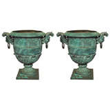 Pair of Cast Iron Urns
