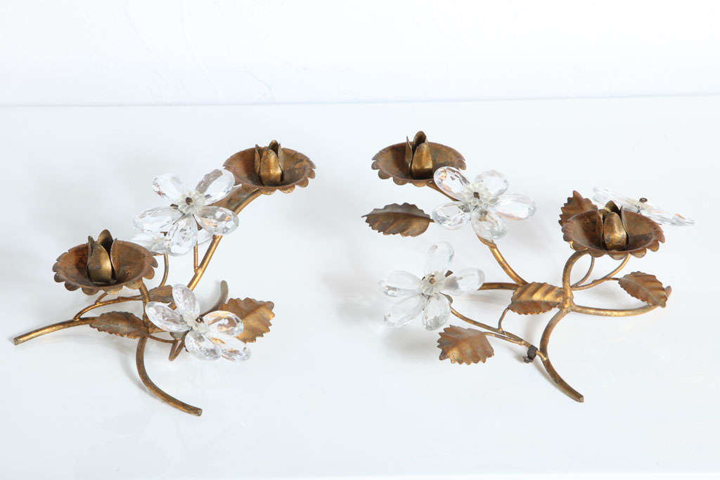 Beautiful candleholders made to look like the flowering branches of a tree. Brass branches and leaves are accompanied by three crystal flowers on each piece.