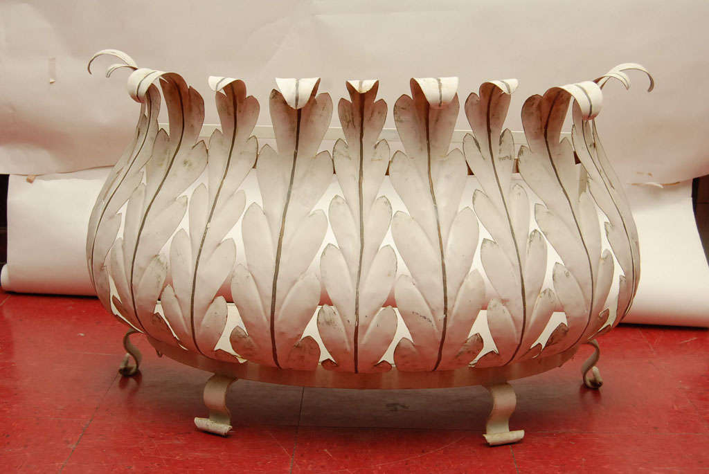 Leaf motif fireplace fender or can be use as planter.
