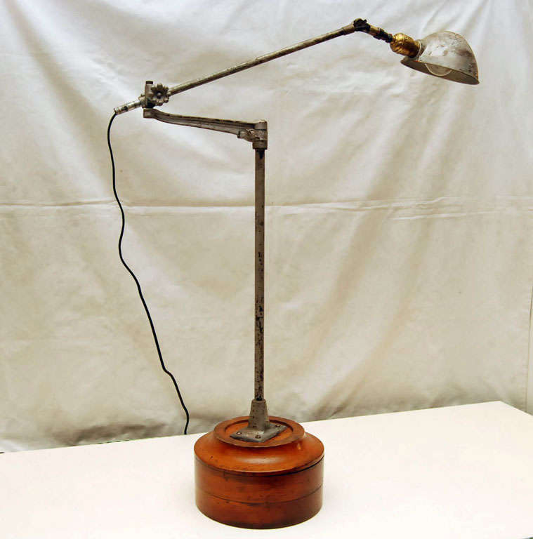 American Articulated Lamp on Wooden Base For Sale